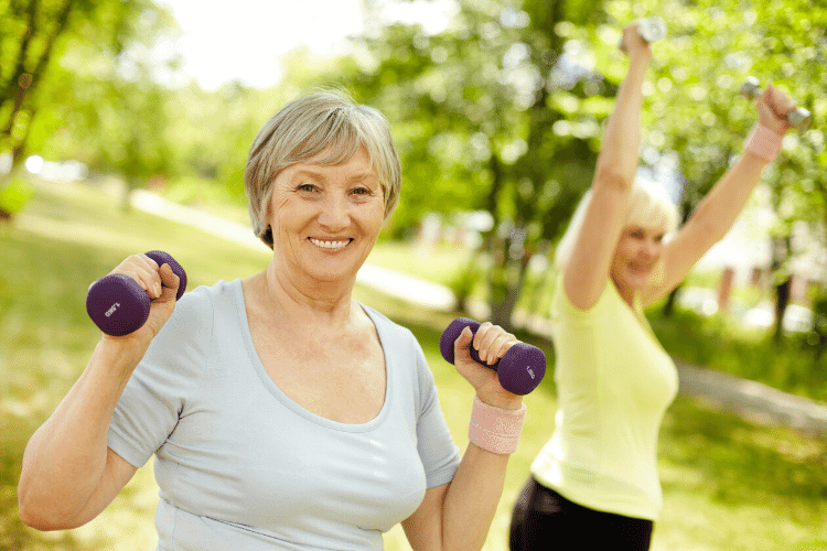 two smiling women exercising for weight loss