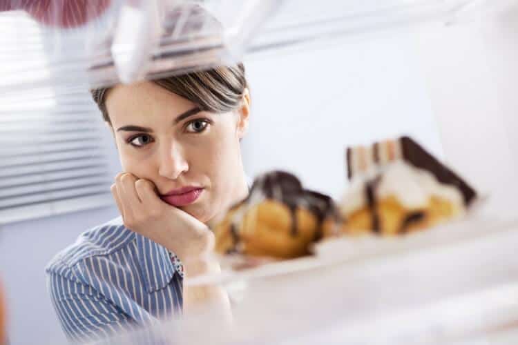 image of women staring at junk food