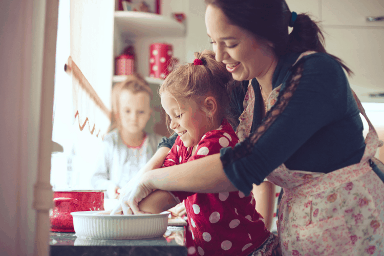 mother and children preparing food