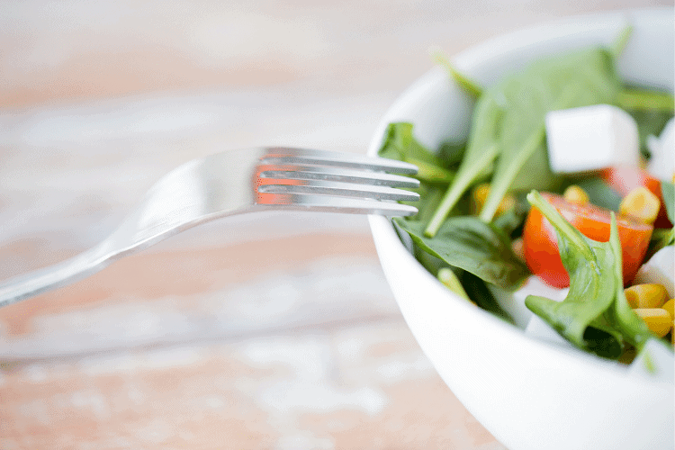 bowl of salad with fork