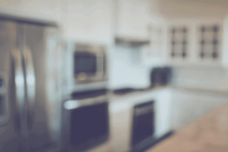 blurry image of a kitchen at night