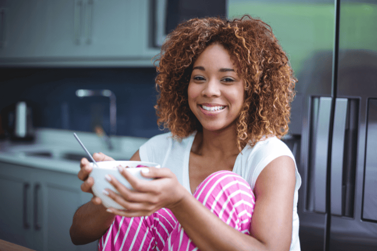 woman eating cereal