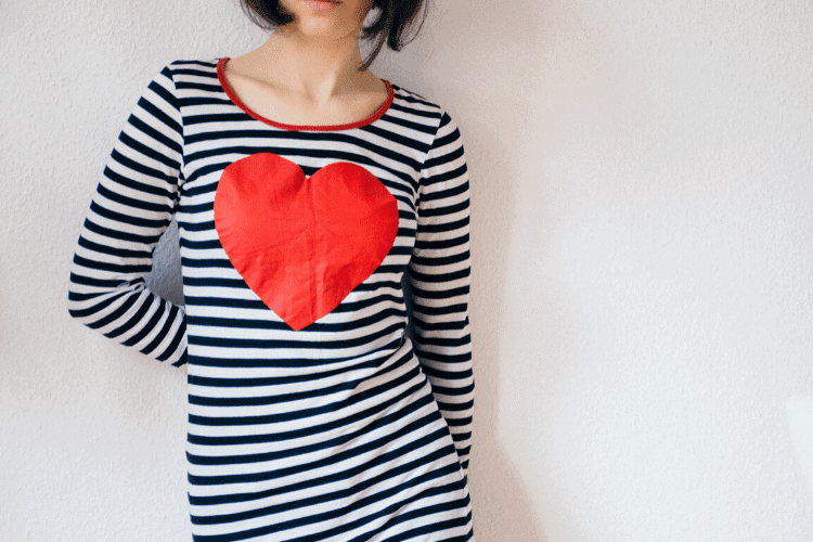 woman wearing striped shirt with red heart